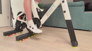 Zwift Ride smart frame on a Wahoo KICKR CORE 2 trainer moving naturally from side to side on ROCKERON rear adapters and a matching front support with colored motion balls.